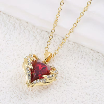 Angel Embrace Ruby Heart Necklace | Gold Maya Henry Jewelry