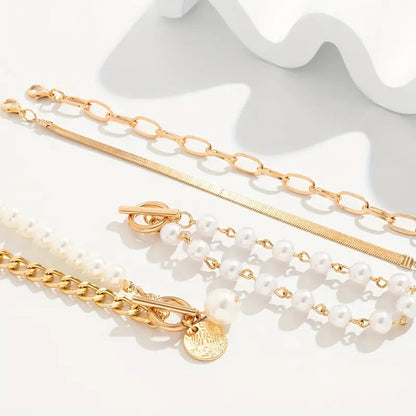 Chic Gold 4-Piece Bracelet Set - Snake, Pearls & Links | Gold Maya Henry Jewelry