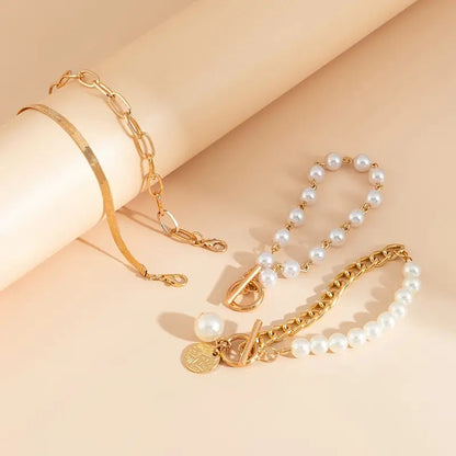Chic Gold 4-Piece Bracelet Set - Snake, Pearls & Links | Gold Maya Henry Jewelry